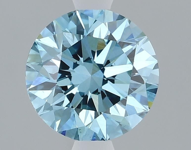 IGI Round 1.32ct Fancy Vivid Blue VS1 - Ideal Lab Diamond: IGI Round 1.32ct Fancy Vivid Blue VS1 - Ideal Lab Diamond Loose Lab Diamond IGI Round, weighing 1.32ct, with a Fancy Vivid Blue color and clarity VS1, certified by IGI. Item Specifics: Source: This Is