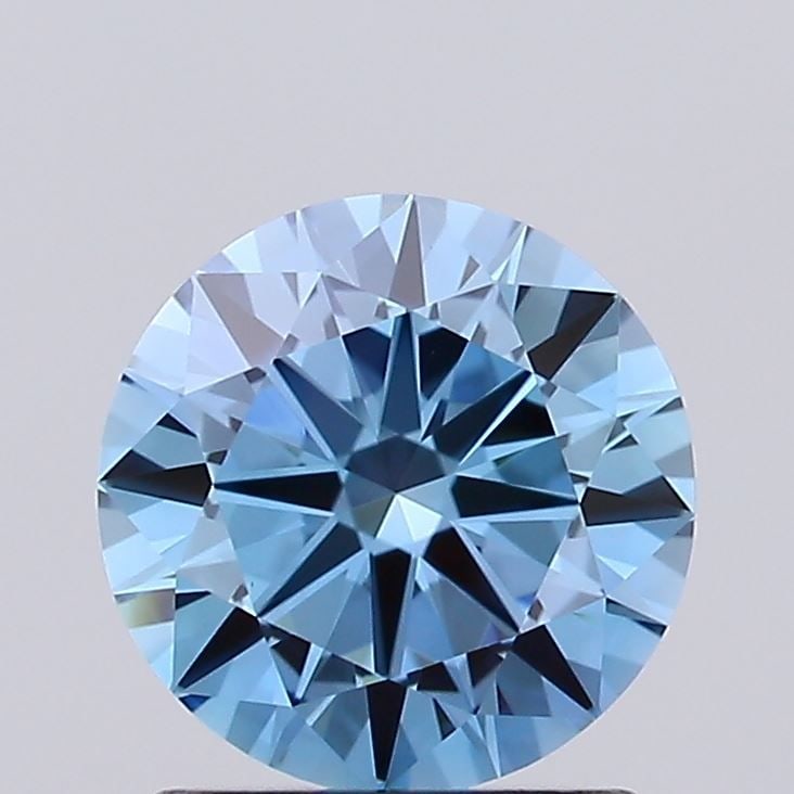 Loose Lab Diamond IGI Round 1.13ct Fancy Vivid Blue VVS2: Loose Lab Diamond IGI Round 1.13ct Fancy Vivid Blue VVS2 This loose lab diamond, certified IGI, weighs 1.13ct and is graded Fancy Vivid Blue with VVS2 clarity, measuring 6.8mm x 6.86mm x 3.96mm. Item