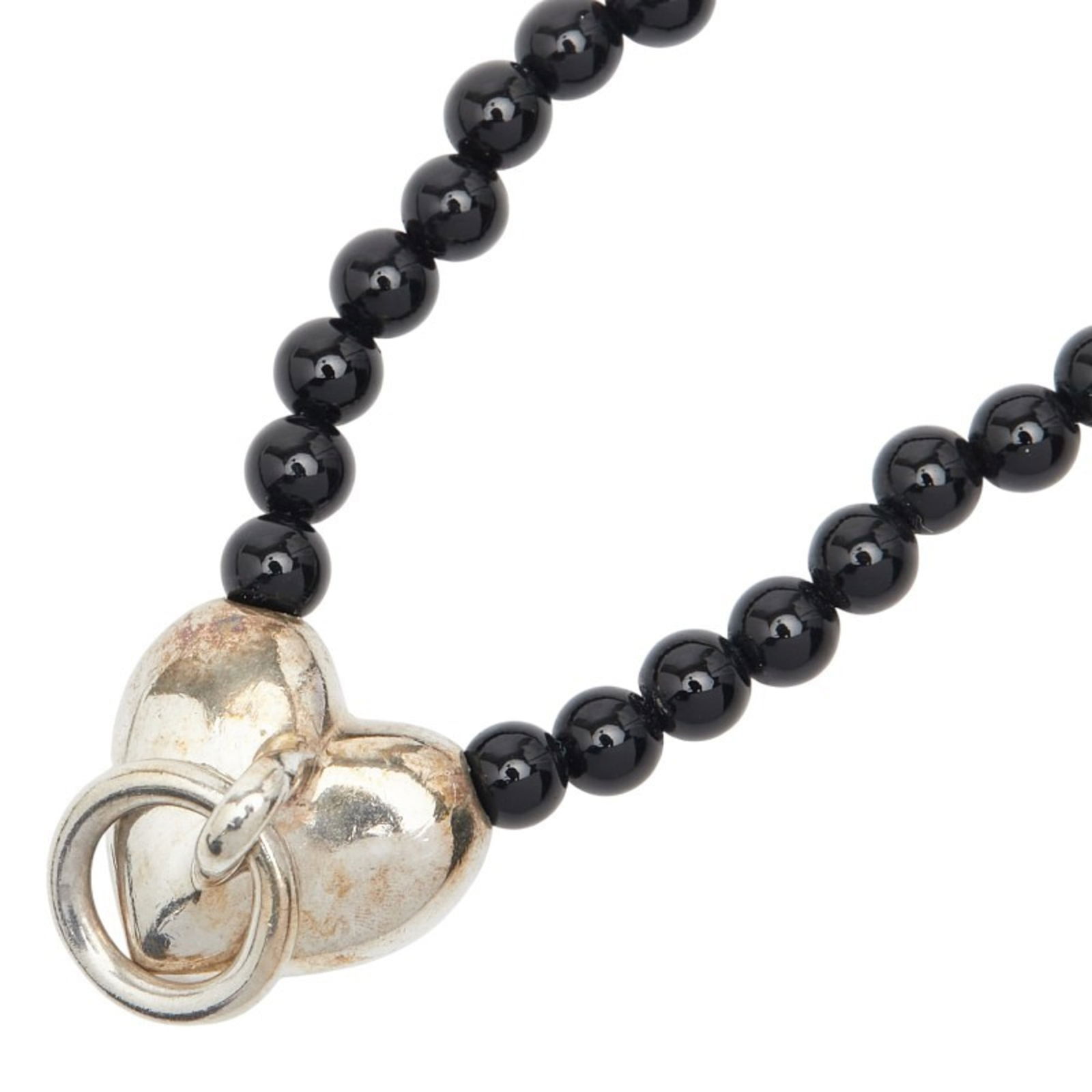 TIFFANY & Co. Women's Silver and Black SV925 Heart Knock Necklace with Onyx: TIFFANY & Co. Women's Silver and Black SV925 Heart Knock Necklace with Onyx Tiffany & Co. women's necklace made of silver 925 with a black onyx heart pendant, measuring 14.8mm x 14.7mm, in good used