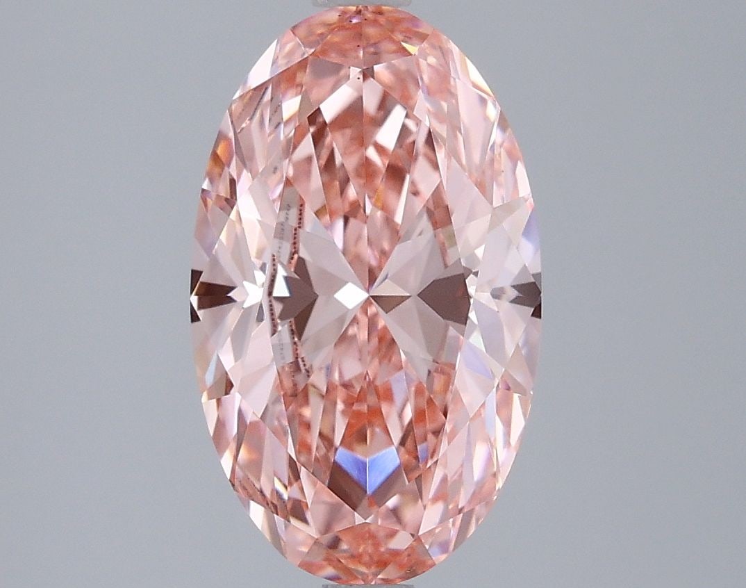 Loose Lab Diamond IGI Oval 3.0ct Fancy Vivid Pink VS1: Loose Lab Diamond IGI Oval 3.0ct Fancy Vivid Pink VS1 Loose lab-grown diamond weighing 3.0ct, IGI certified, with a fancy vivid pink color and clarity grade of VS1, featuring excellent polish and