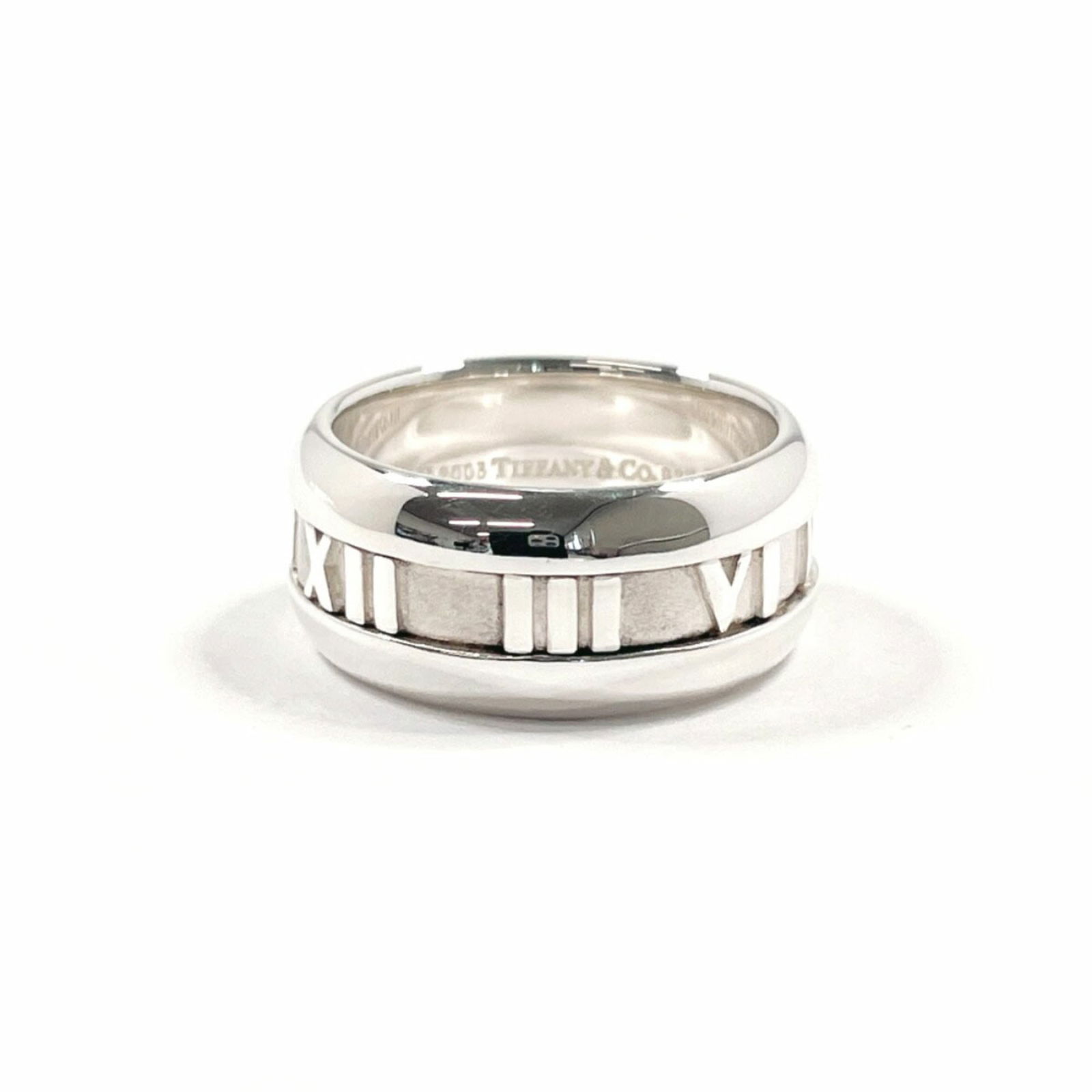 Silver 925 Tiffany Band Ring: Silver 925 Tiffany Band Ring Tiffany 925 silver band ring for women in size 7, featuring a width of 9.1mm and weighing 8.9g; condition is used with some traces of wear. Item Specifics: Brand: