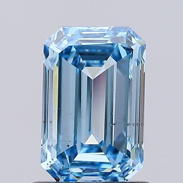 Loose Lab Diamond IGI Emerald 1.08ct Fancy Vivid Blue SI1: Loose Lab Diamond IGI Emerald 1.08ct Fancy Vivid Blue SI1 Loose Lab Diamond IGI Emerald weighing 1.08ct with fancy vivid blue color and clarity SI1, certified by IGI. Dimensions are 6.91L x 4.52W x 3.