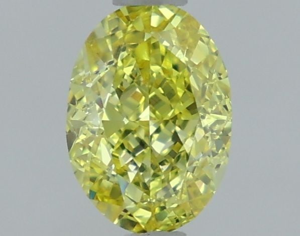 Loose Lab Diamond IGI Oval 1.13ct Fancy Vivid Yellow VVS2: Loose Lab Diamond IGI Oval 1.13ct Fancy Vivid Yellow VVS2 Loose Lab Diamond IGI Oval, 1.13ct, in Fancy Vivid Yellow color and VVS2 clarity. Certified by IGI, with measurements of 7.33L x 5.16W x