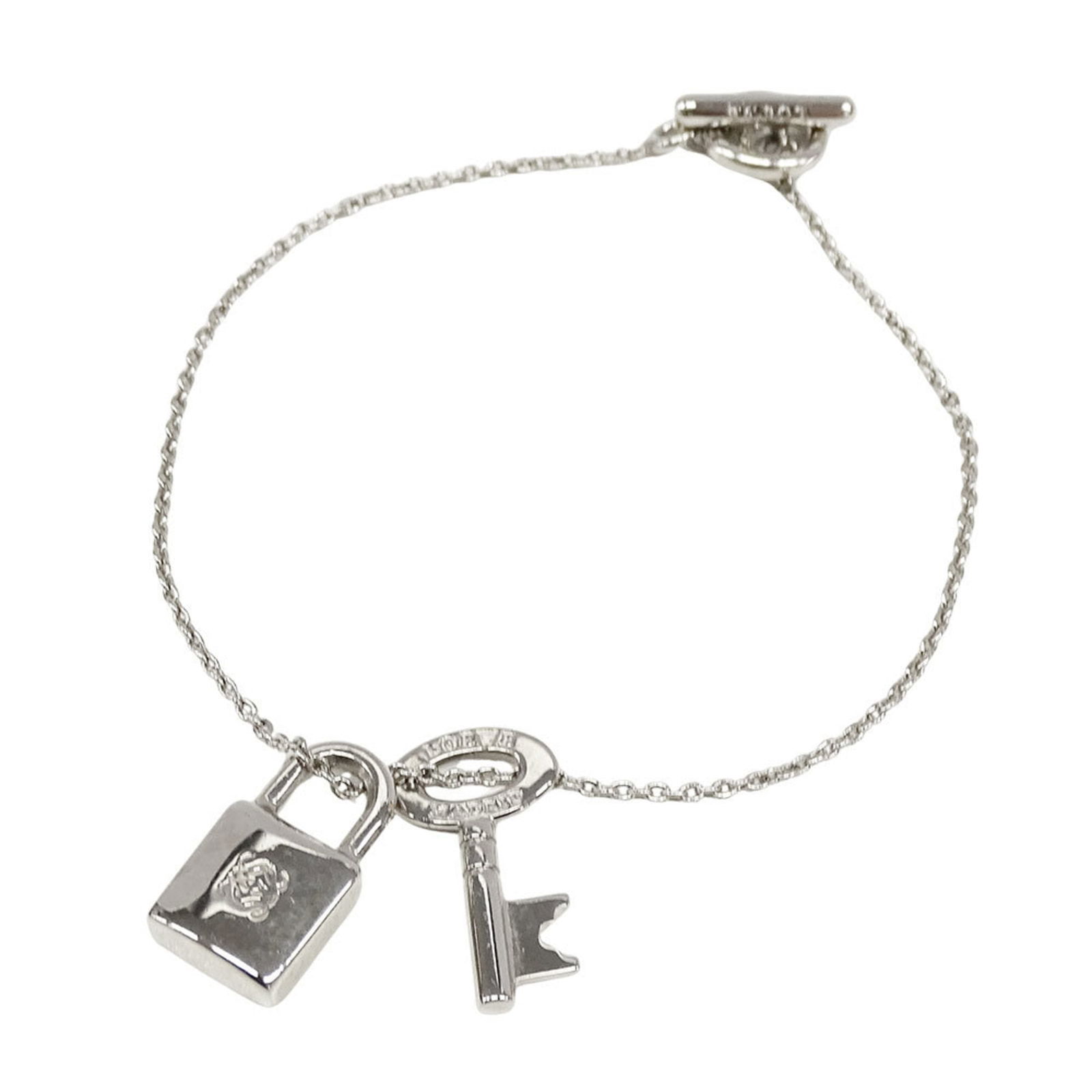 Plating Loewe Charm Bracelet Gold: Plating Loewe Charm Bracelet Gold Loewe gold-plated charm bracelet for women, measuring 18.5cm in length and in used condition with visible signs of wear. Item Specifics: Brand: Loewe Type: Charm Brac
