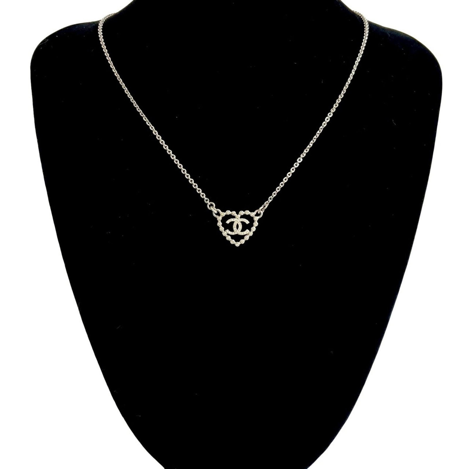 22353 CHANEL Coco Mark Heart Motif Rhinestone Necklace Pendant Silver: 22353 CHANEL Coco Mark Heart Motif Rhinestone Necklace Pendant Silver This listing features 22353 CHANEL Coco Mark Heart Motif Rhinestone Necklace Pendant Silver. Item specifics are provided below. 