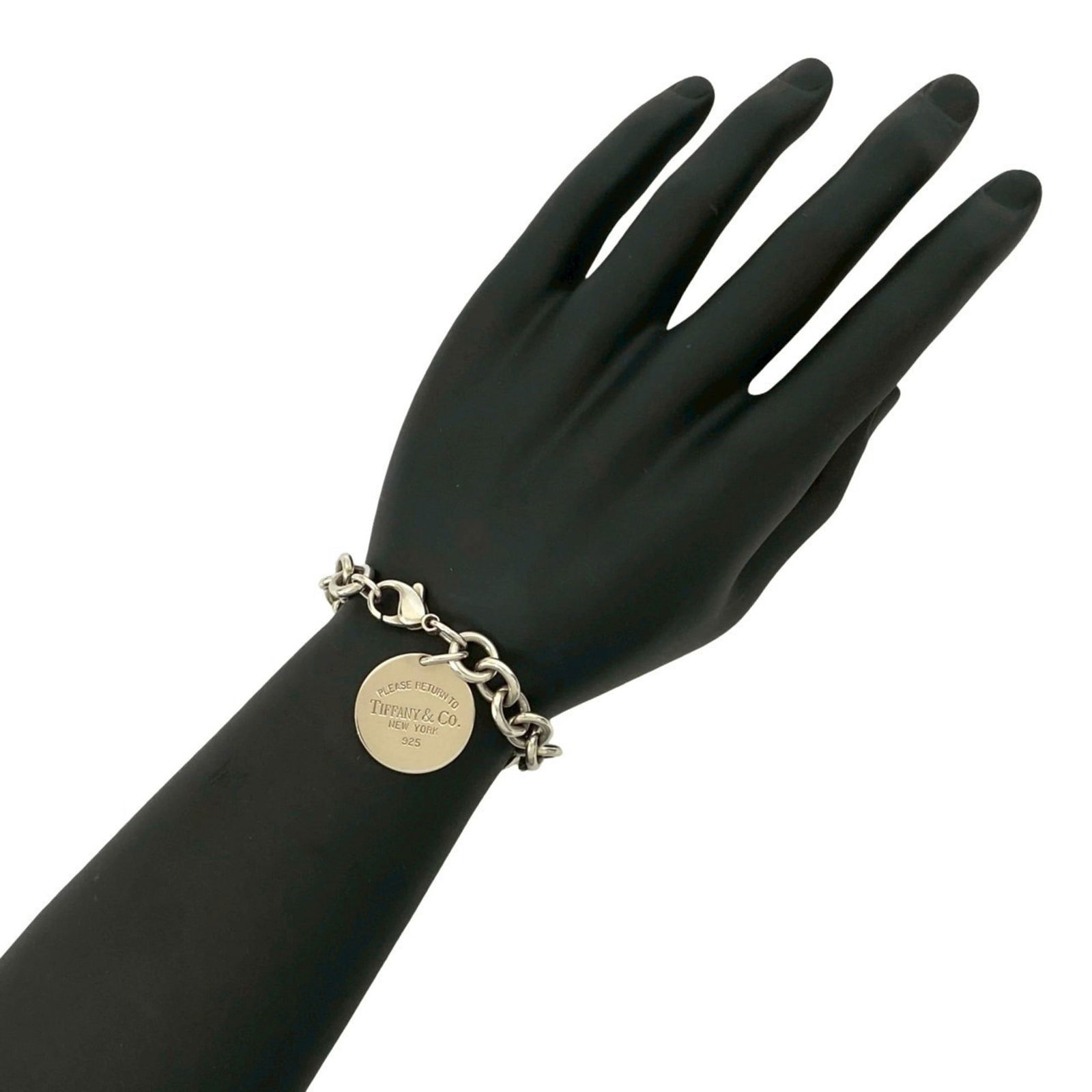 Silver 925 Tiffany Charm Bracelet: Silver 925 Tiffany Charm Bracelet This Silver 925 Tiffany Charm Bracelet is 19.5cm long, designed for women, and in good used condition with some signs of wear. Item Specifics: Brand: Tiffany Type: