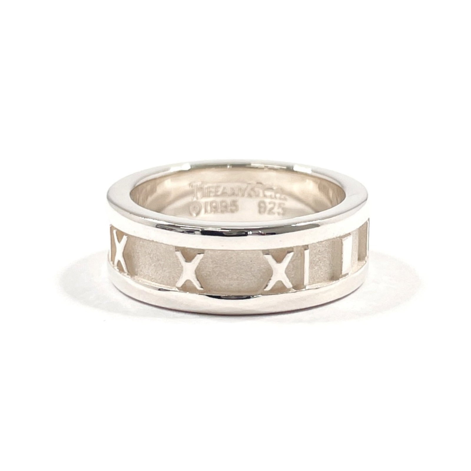 Silver 925 Tiffany Band Ring: Silver 925 Tiffany Band Ring This Silver 925 band ring by Tiffany is designed for women, is size 4.5, and is in like-new condition with minimal signs of use. Item Specifics: Brand: Tiffany Type: Band