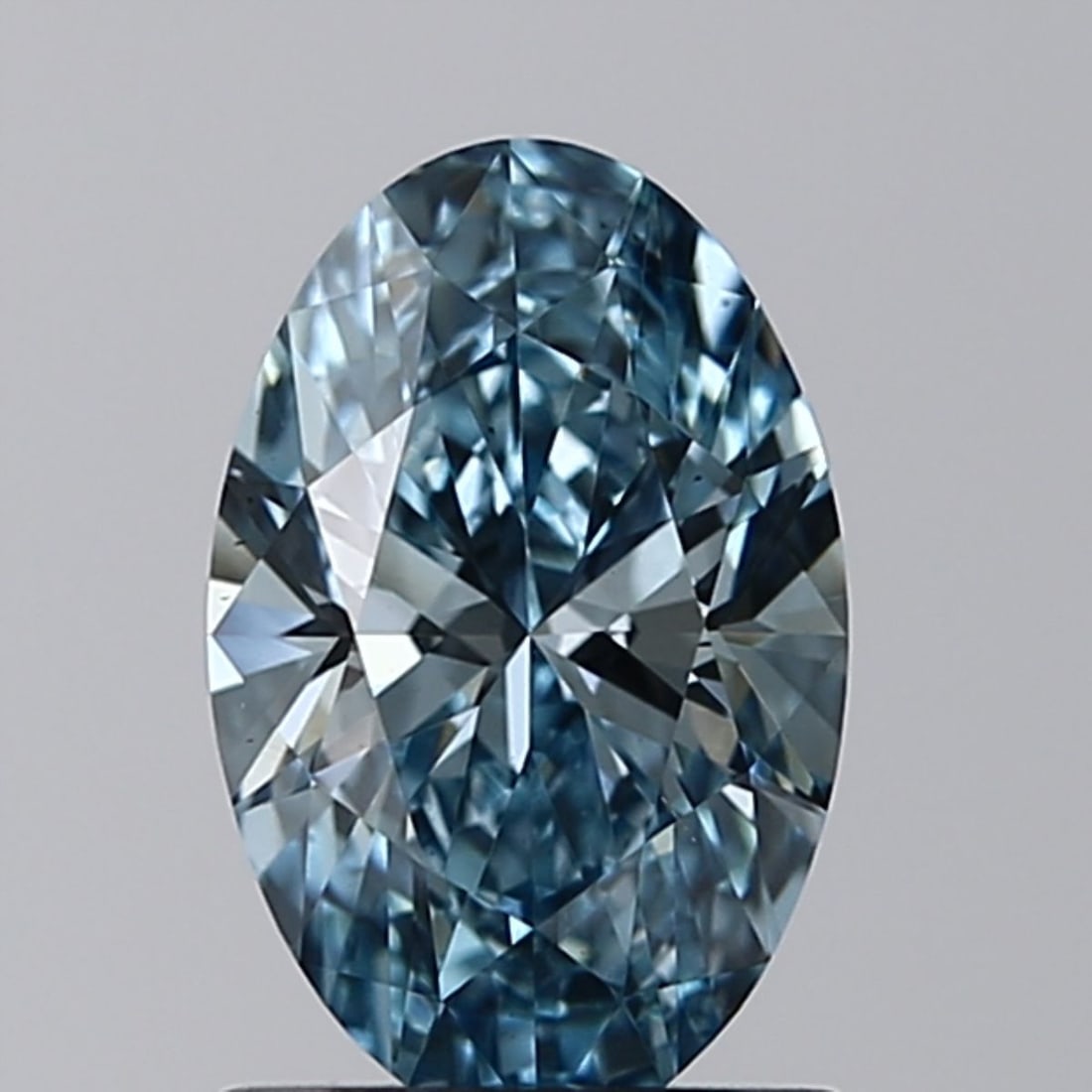 Loose Lab Diamond IGI Oval 1.01ct Fancy Vivid Blue VS2: Loose Lab Diamond IGI Oval 1.01ct Fancy Vivid Blue VS2 Loose lab-grown diamond weighing 1.01ct, oval cut, with a fancy vivid blue color and VS2 clarity. Certified by IGI, it features excellent polish
