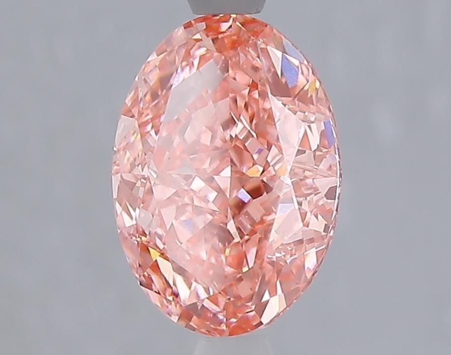 Loose Lab Diamond 2.06ct IGI Oval Fancy Vivid Pink VVS2: Loose Lab Diamond 2.06ct IGI Oval Fancy Vivid Pink VVS2 Loose lab diamond weighing 2.06ct with an oval cut, fancy vivid pink color, and clarity VVS2, certified by IGI; includes very good polish and