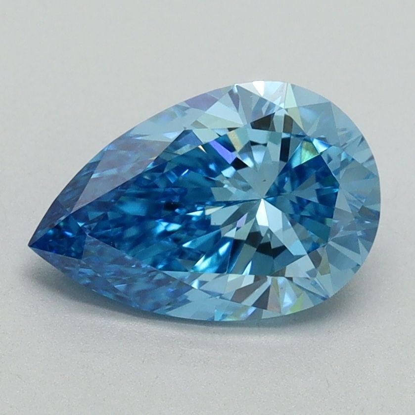 Loose Lab Diamond IGI Pear 1.51ct Fancy Vivid Blue VS1: Loose Lab Diamond IGI Pear 1.51ct Fancy Vivid Blue VS1 Loose lab-grown diamond weighing 1.51ct with IGI certification, presenting a Fancy Vivid Blue color and VS1 clarity. Measurements are 9.74L x