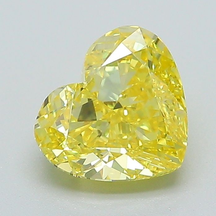 Loose Lab Diamond IGI Heart 1.55ct Fancy Vivid Yellow VS1: Loose Lab Diamond IGI Heart 1.55ct Fancy Vivid Yellow VS1 Loose lab-grown diamond of 1.55ct in a heart shape, with a fancy vivid yellow color and VS1 clarity, certified by IGI and measuring 6.67L x 7.