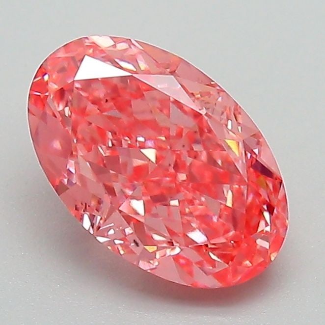 Loose Lab Diamond 1.58ct Fancy Vivid Pink VS2 - IGI Oval: Loose Lab Diamond 1.58ct Fancy Vivid Pink VS2 - IGI Oval Loose Lab Diamond weighing 1.58ct, colored Fancy Vivid Pink with VS2 clarity, certified by IGI, featuring oval cut with measurements of 8.72L x