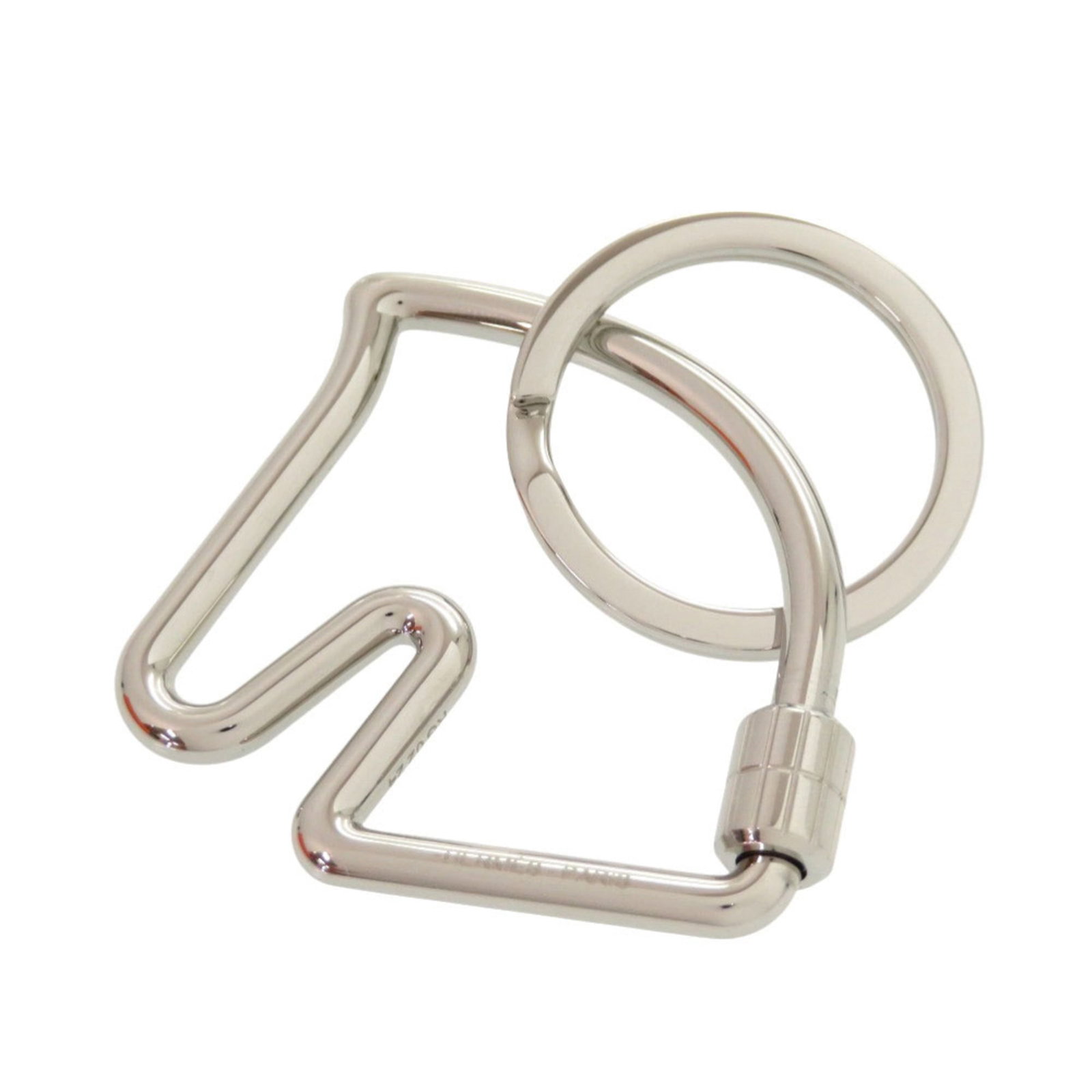 Metal Handbag Charm Hermes: Metal Handbag Charm Hermes Hermes Metal Handbag Charm, unisex, made of silver metal, measuring 50mm x 45mm, in used (like new) condition with minimal traces of usage. Item Specifics: Brand: Hermes