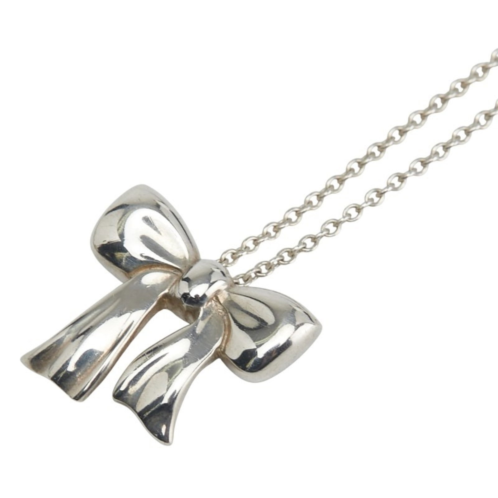 Tiffany & Co. 925 Sterling Silver Ribbon Necklace for Women: Tiffany & Co. 925 Sterling Silver Ribbon Necklace for Women This listing features Tiffany & Co. 925 Sterling Silver Ribbon Necklace for Women. Item specifics are provided below. Item Specifics: Brand: