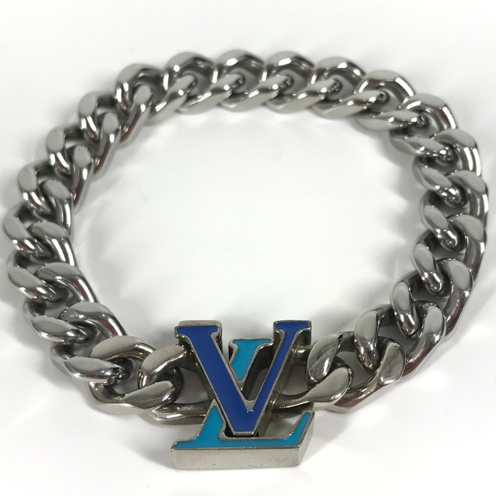 Metal Charm Bracelet by Louis Vuitton: Metal Charm Bracelet by Louis Vuitton This listing features Metal Charm Bracelet by Louis Vuitton. Item specifics are provided below. Item Specifics: Brand: Louis Vuitton Type: Charm Bracelet