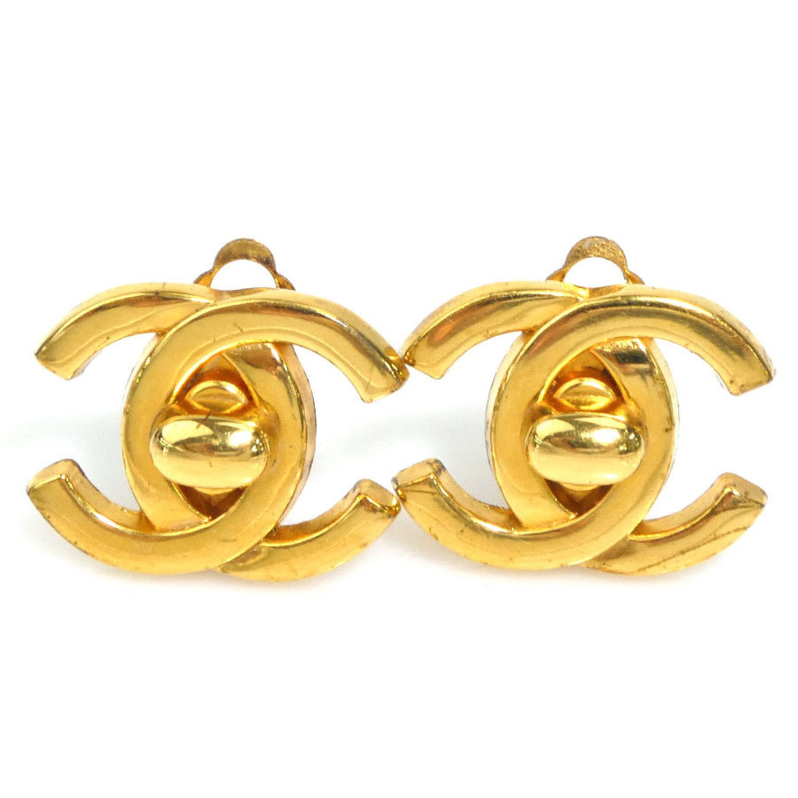 Chanel Metal Clip Earrings: Chanel Metal Clip Earrings Chanel metal clip earrings in gold, measuring 17.00mm x 21.00mm, showing signs of wear but generally in good condition. Item Specifics: Brand: Chanel Type: Clip Earrings Gen