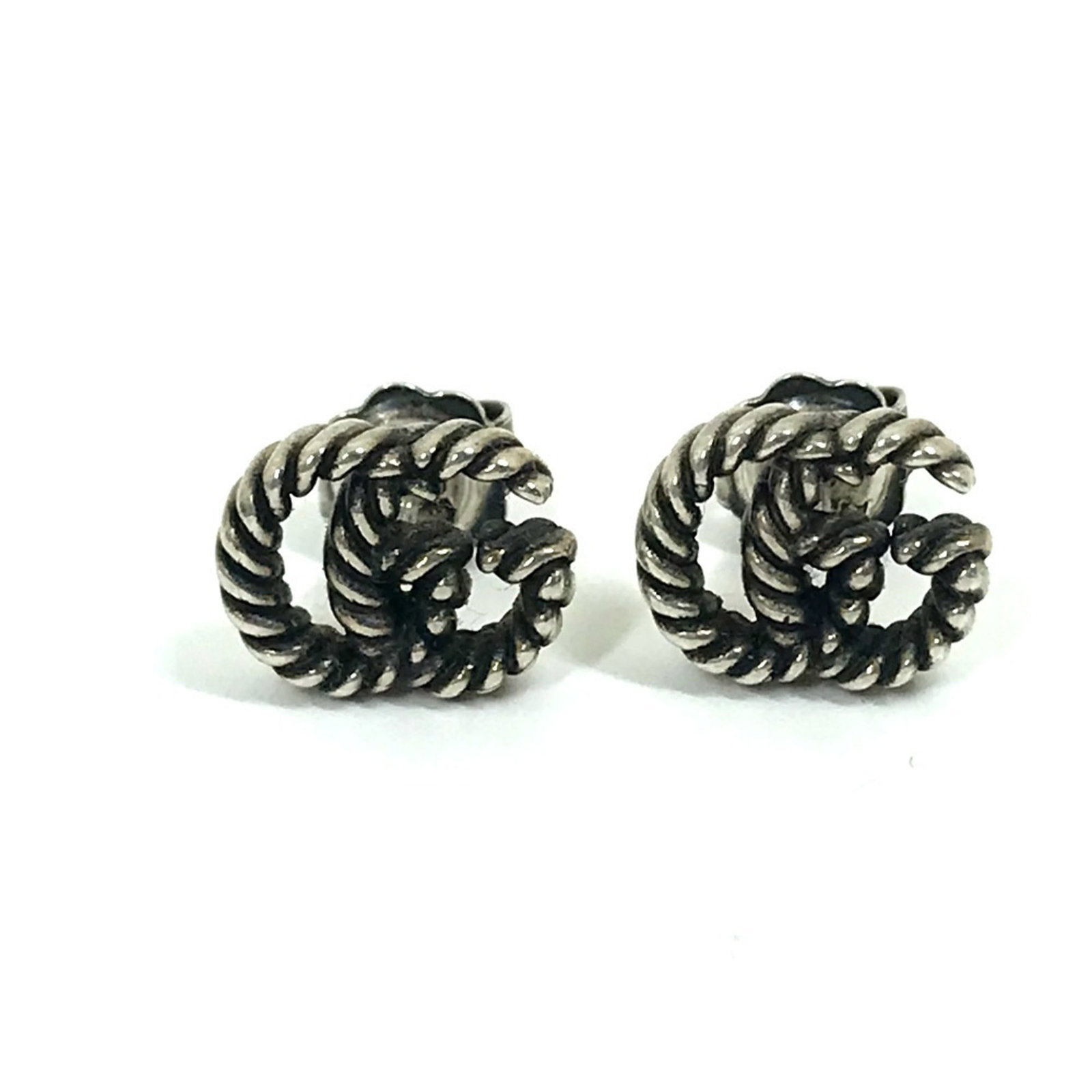 Gucci Silver 925 Stud Earrings: Gucci Silver 925 Stud Earrings This listing features Gucci Silver 925 Stud Earrings. Item specifics are provided below. Item Specifics: Brand: Gucci Type: Stud Earrings Gender: Women Material: Silver