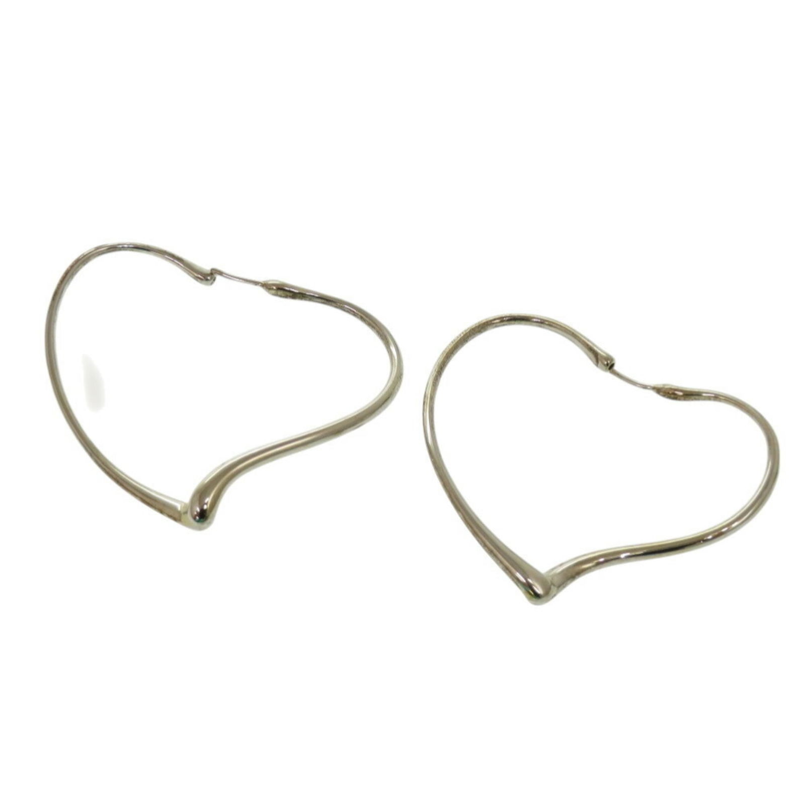Tiffany Silver 925 Hoop Earrings: Tiffany Silver 925 Hoop Earrings This listing features Tiffany Silver 925 Hoop Earrings. Item specifics are provided below. Item Specifics: Brand: Tiffany Type: Hoop Earrings Gender: Women Material: S