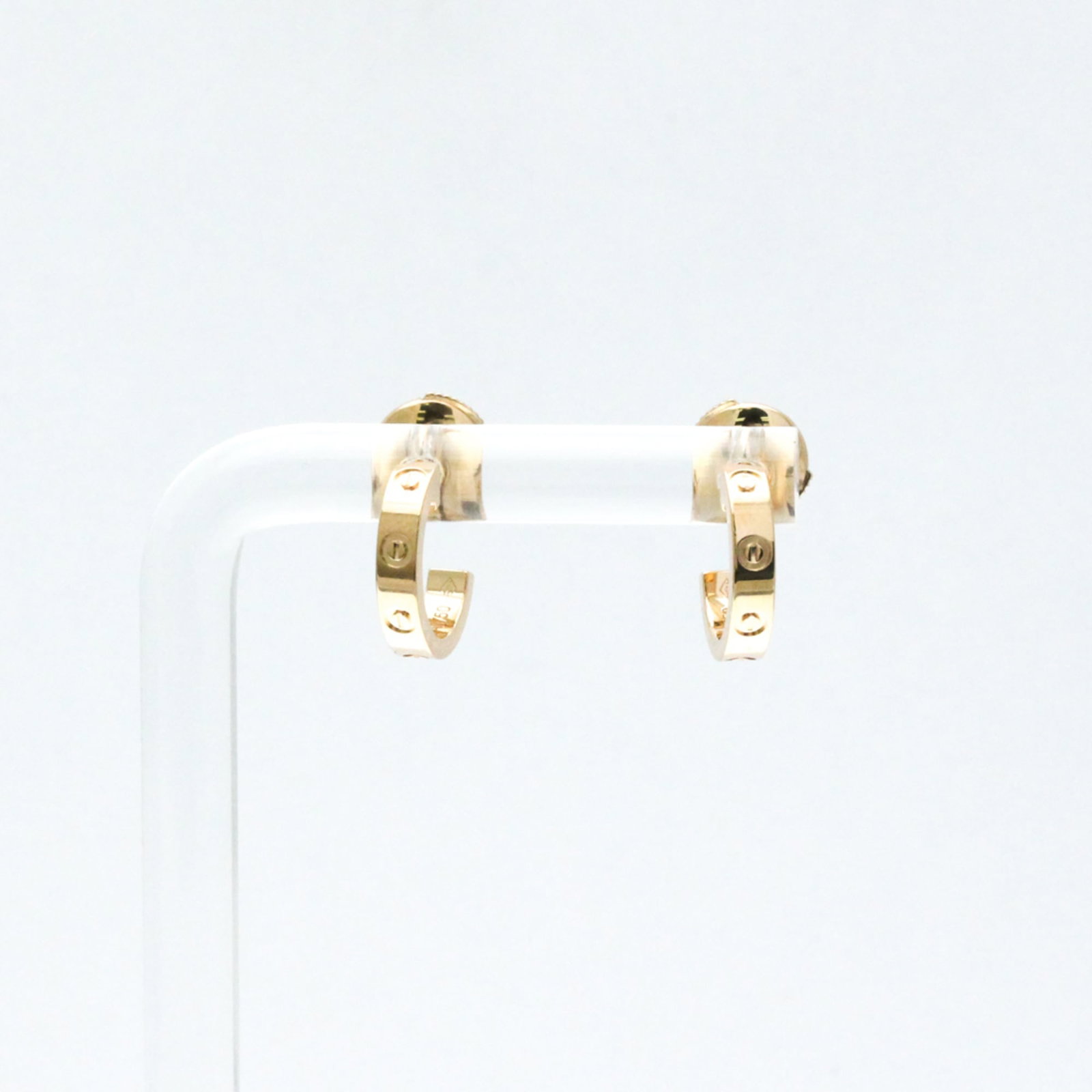 Cartier 18K Pink Gold Half Hoop Earrings: Cartier 18K Pink Gold Half Hoop Earrings This listing features Cartier 18K Pink Gold Half Hoop Earrings. Item specifics are provided below. Item Specifics: Brand: Cartier Type: Half Hoop Earrings Styl