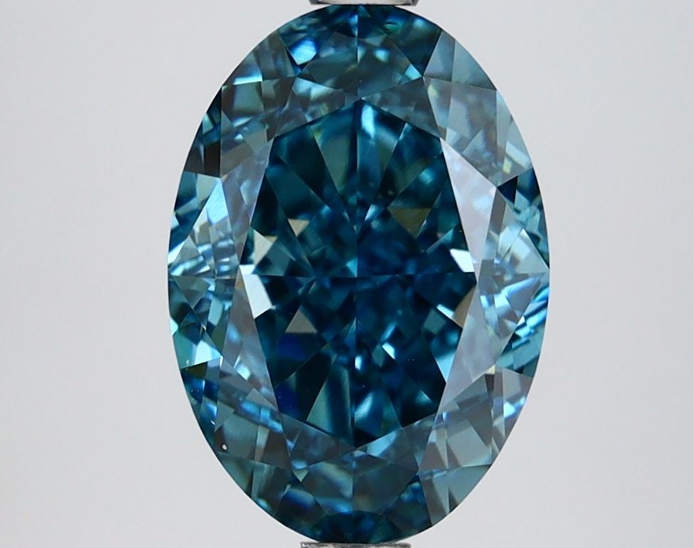 Loose Lab Diamond IGI Oval 3.03ct Fancy Vivid Blue VS1: Loose Lab Diamond IGI Oval 3.03ct Fancy Vivid Blue VS1 Loose lab-grown diamond weighing 3.03ct, with a Fancy Vivid Blue color and VS1 clarity, certified by IGI; measurements are 10.48 x 7.33 x 5.02