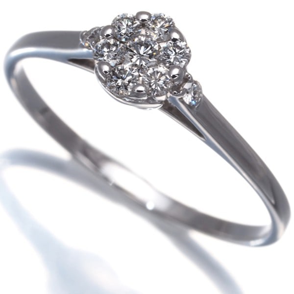 18K 750 White Gold Diamond Flower Ring: 18K 750 White Gold Diamond Flower Ring IWC men's wristwatch with a stainless steel case and band, featuring a black dial, 42mm case diameter, in very good used condition with minor traces of usage. It