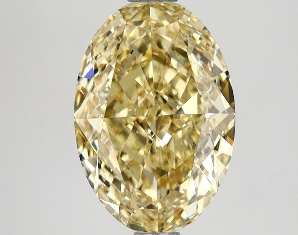 Loose Lab Diamond IGI Oval 2.65ct Fancy Vivid Yellow VS1: Loose Lab Diamond IGI Oval 2.65ct Fancy Vivid Yellow VS1 Loose Lab Diamond, IGI certified, weighing 2.65 carats with a Fancy Vivid Yellow color and VS1 clarity. Measurements are 10.56L x 7.23W x