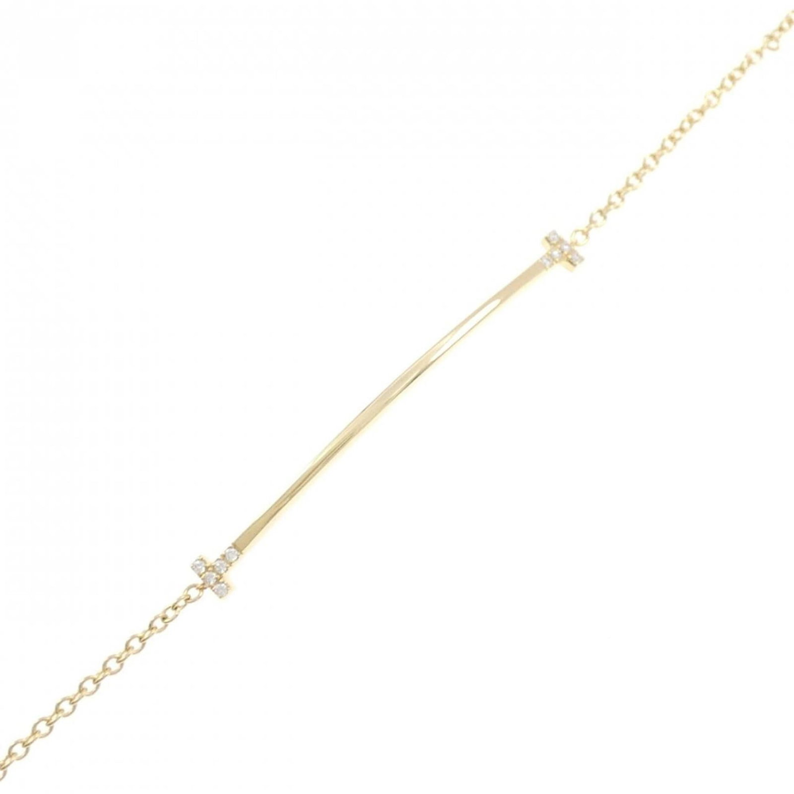 Yellow Gold (18K) Tiffany Charm Bracelet: Yellow Gold (18K) Tiffany Charm Bracelet Tiffany charm bracelet made from 18K yellow gold, measuring 16.5cm in length. Used in like-new condition with minimal signs of wear. Item Specifics: Brand: