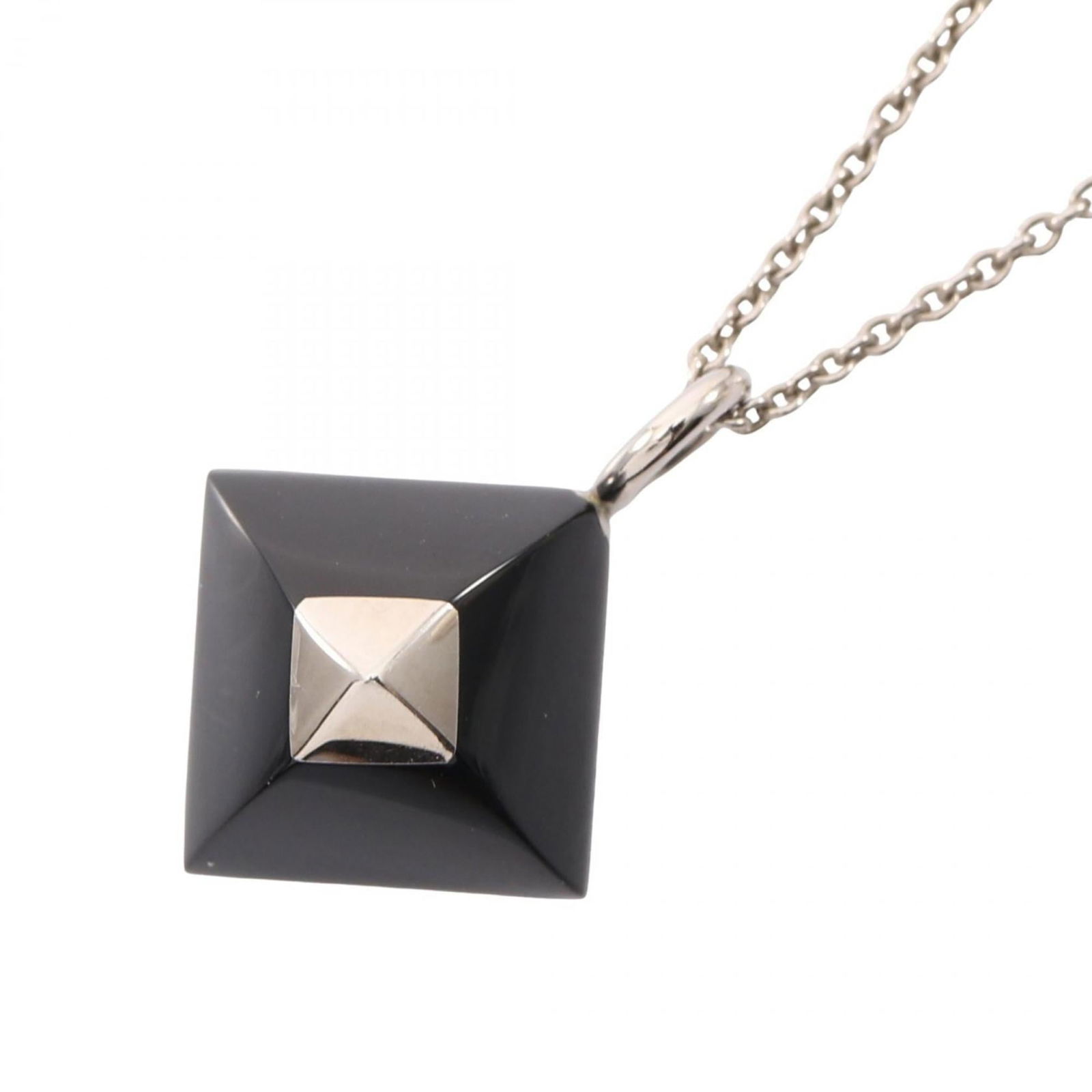 Hermes Medor Cupid Necklace Stainless Steel, Black and Silver: Hermes Medor Cupid Necklace Stainless Steel, Black and Silver Hermes Medor Cupid Necklace for women crafted from stainless steel, featuring a black and silver finish with an adjustable neck