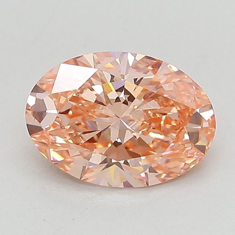 Loose Lab Diamond IGI Oval 1.5ct Fancy Vivid Pink VVS2: Loose Lab Diamond IGI Oval 1.5ct Fancy Vivid Pink VVS2 Loose lab-grown diamond weighing 1.5ct with a fancy vivid pink color and VVS2 clarity, certified by IGI. Measurements are 9.14L x 6.48W x 4.07H.