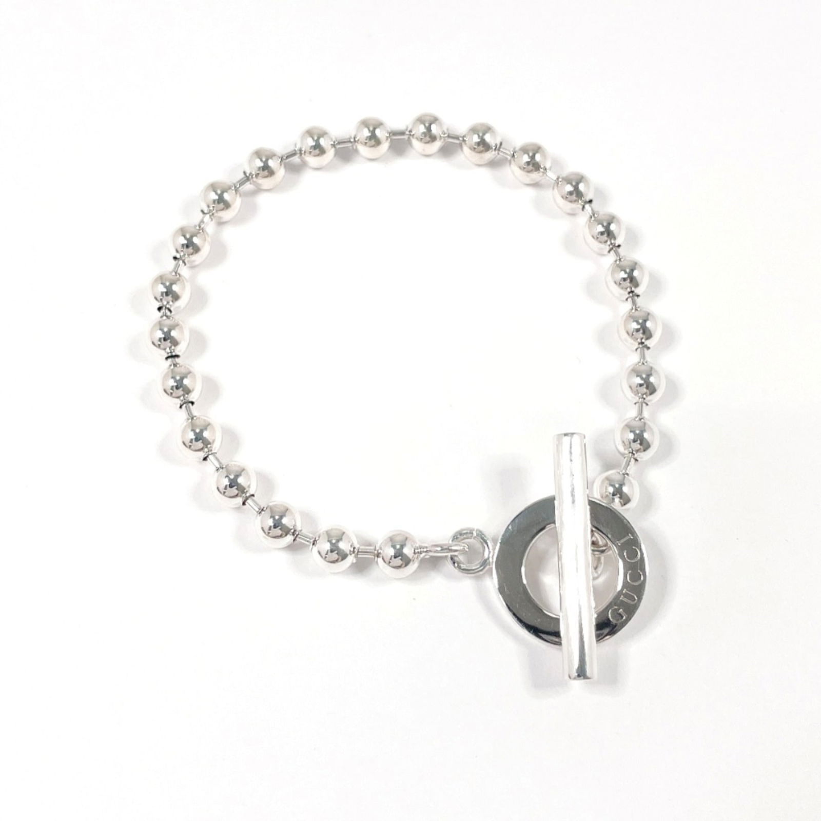 Gucci Silver 925 Charm Bracelet: Gucci Silver 925 Charm Bracelet Gucci Silver 925 Charm Bracelet suitable for both women and men, measuring 16.5cm in length, in very good condition with minor scratches. Item Specifics: Brand: Gucci T