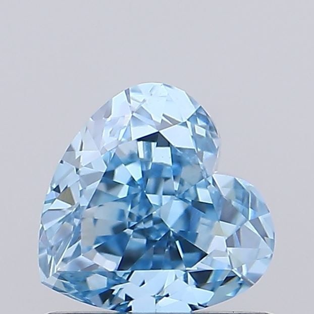 IGI Loose Lab Diamond Heart 1.0ct Fancy Vivid Blue VVS2: IGI Loose Lab Diamond Heart 1.0ct Fancy Vivid Blue VVS2 IGI certified loose lab diamond weighing 1.0ct with a heart shape, fancy vivid blue color, and VVS2 clarity, boasting excellent polish and symme