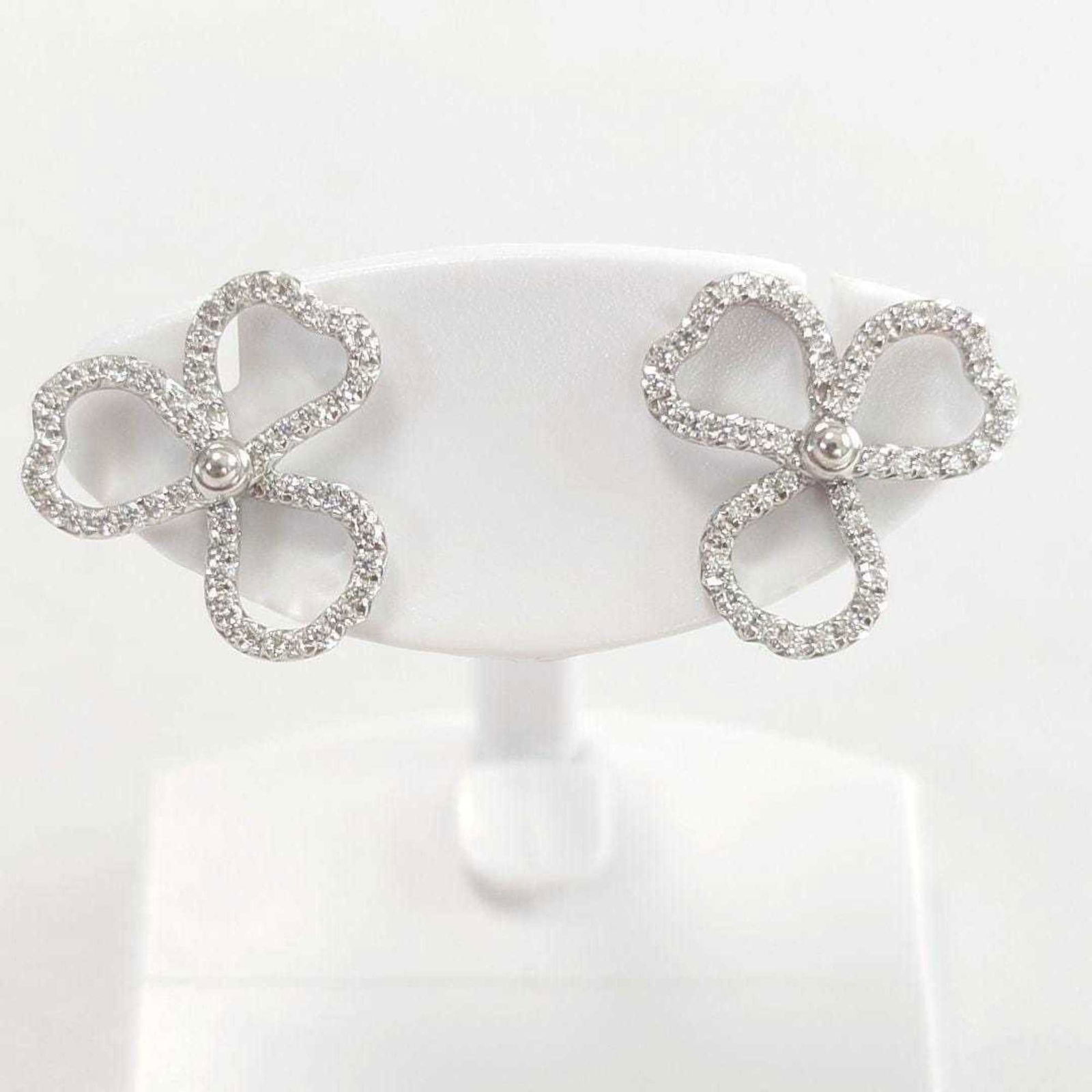 Tiffany Platinum Stud Earrings: Tiffany Platinum Stud Earrings Tiffany stud earrings made of platinum (platinum950) featuring diamonds, size 11.60mm x 11.80mm, used in good condition, described as mint or like new. Item Specifics: