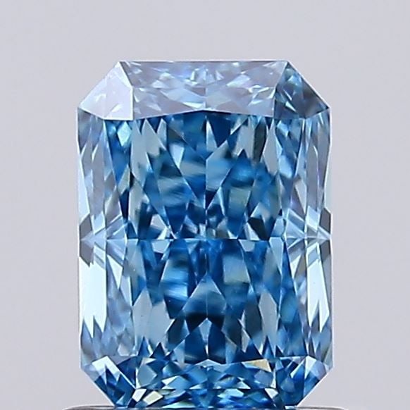 Loose Lab Diamond IGI Radiant 1.05ct Fancy Vivid Blue VVS2: Loose Lab Diamond IGI Radiant 1.05ct Fancy Vivid Blue VVS2 Loose lab-grown diamond, 1.05 ct, Fancy Vivid Blue color, VVS2 clarity, with IGI certification, measuring 6.72L x 4.78W x 3.42H mm. Item