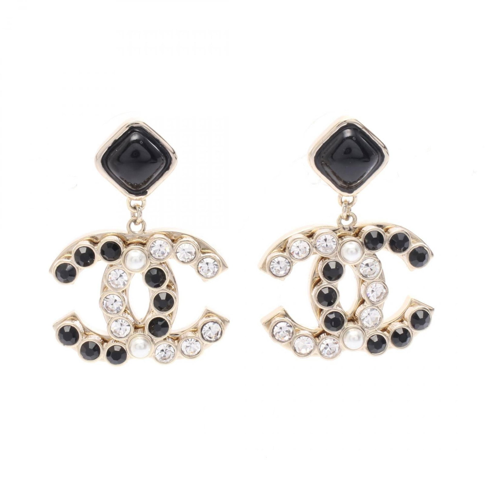 Gold Plating Chanel Stud Earrings: Gold Plating Chanel Stud Earrings These Gold Plating Chanel Stud Earrings feature rhinestones in black and white, measure 25.00mm x 32.00mm, and are in very good used condition. Item Specifics: Brand: