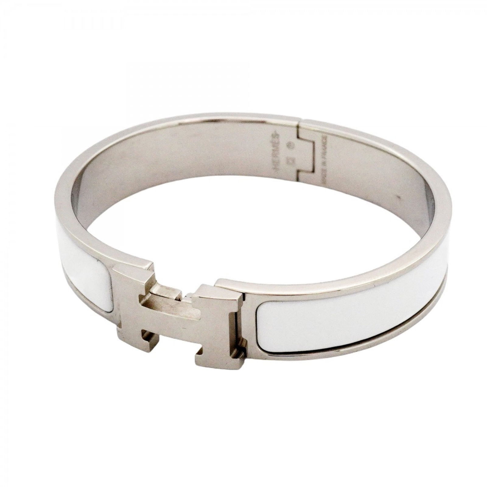 Hermes Metal Bangle: Hermes Metal Bangle Hermes Metal Bangle for women, made of silver and white metal, measures 15.5 cm (6.1'') in length. Condition is used (good) with visible traces of usage. Item Specifics: Brand: Her