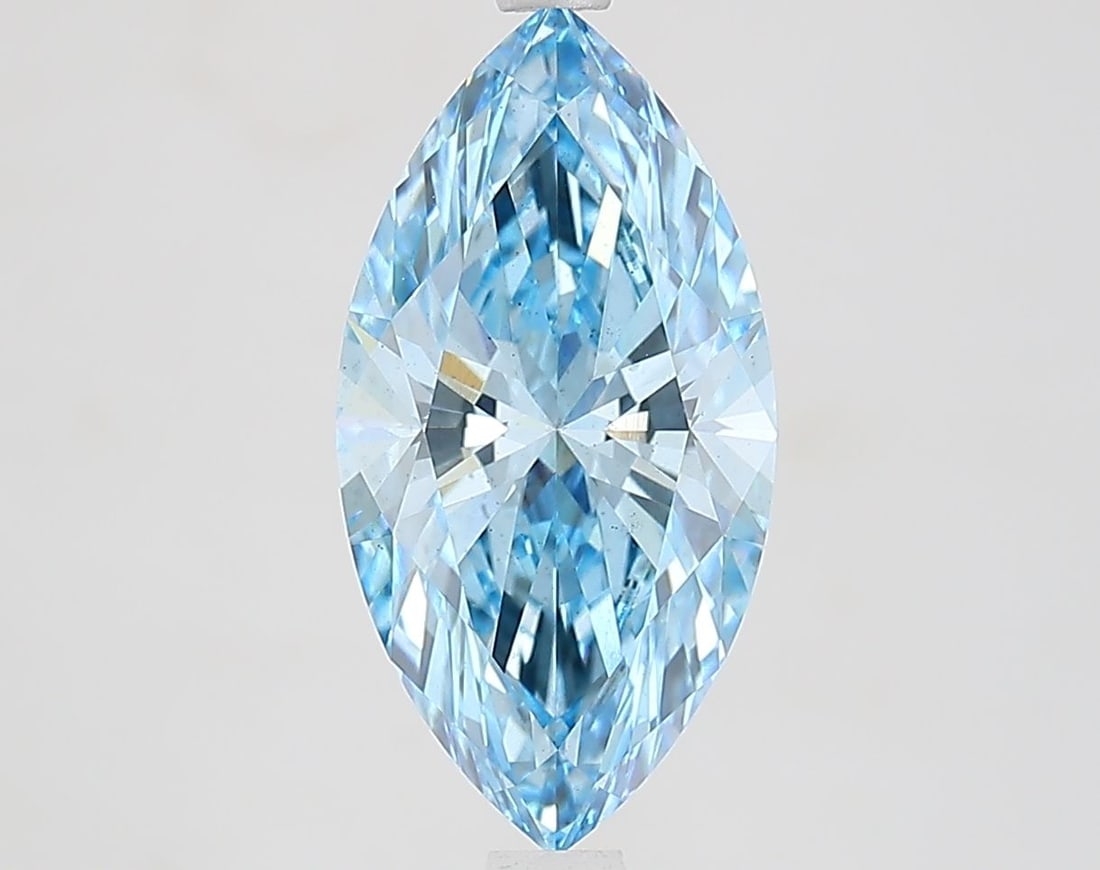 Loose Lab Diamond - IGI Marquise 2.59ct Fancy Vivid Blue VS2: Loose Lab Diamond - IGI Marquise 2.59ct Fancy Vivid Blue VS2 Loose lab-grown diamond, IGI certified, marquise cut, weighing 2.59 carats, with a fancy vivid blue color and VS2 clarity, sizes at 14.09L