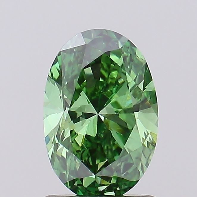 Loose Lab Diamond 1.0ct Fancy Vivid Green VS2 Oval IGI: Loose Lab Diamond 1.0ct Fancy Vivid Green VS2 Oval IGI This 1.0ct lab-grown diamond is a Fancy Vivid Green VS2 with good polish and symmetry, certified by IGI. Its measurements are 8.17L x 5.48W x