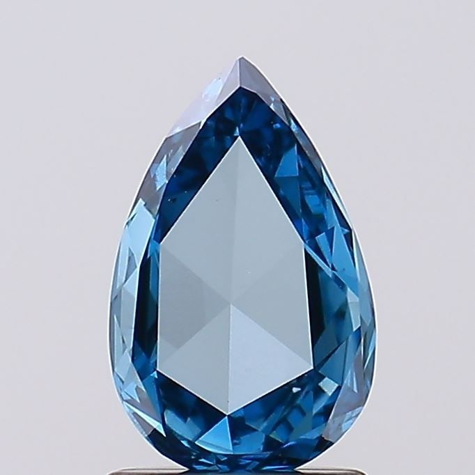 Loose Lab Diamond Pear 1.14ct Fancy Vivid Blue VS1: Loose Lab Diamond Pear 1.14ct Fancy Vivid Blue VS1 Loose lab-grown pear-shaped diamond of 1.14ct, color Fancy Vivid Blue, and clarity VS1. It features excellent polish and good symmetry, though it is