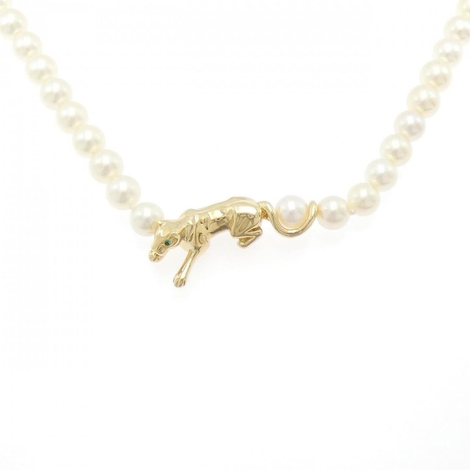 Cartier Necklace Panthre 6.5-7mm: Cartier Necklace Panthre 6.5-7mm Cartier women's necklace made of 18K yellow gold, featuring emerald and pearl, weighing 32.9 g with a neck circumference of 41 cm, in very good used condition. Item Sp