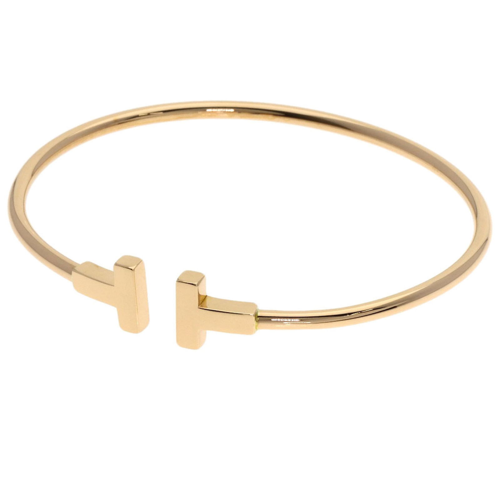 Tiffany Bracelet Charm: Tiffany Bracelet Charm Tiffany charm bracelet in 18K gold, designed for women, measuring 16cm in length and 2.4mm in width, in very good used condition with minor wear. Item Specifics: Brand: