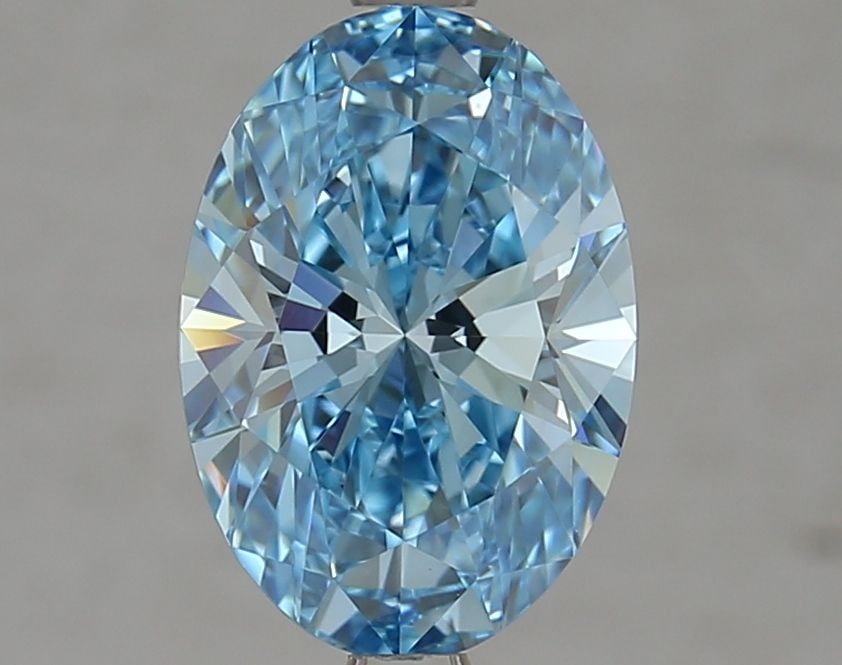 Loose Lab Diamond IGI Oval 2.34ct Fancy Vivid Blue VVS2: Loose Lab Diamond IGI Oval 2.34ct Fancy Vivid Blue VVS2 This 2.34ct oval loose lab diamond features a fancy vivid blue color and VVS2 clarity, with measurements of 10.66L x 7.46W x 4.68H, certified