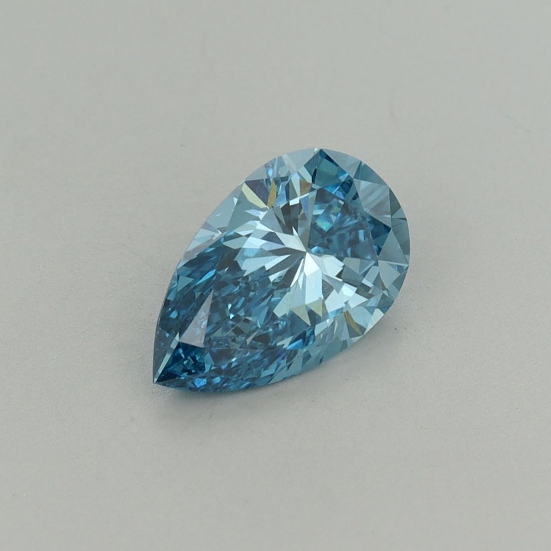 Loose Lab Diamond IGI Pear 1.05ct Fancy Vivid Blue VS1: Loose Lab Diamond IGI Pear 1.05ct Fancy Vivid Blue VS1 Loose lab-grown pear diamond weighing 1.05 carats, fancy vivid blue color, clarity VS1, with IGI certification, featuring excellent polish and
