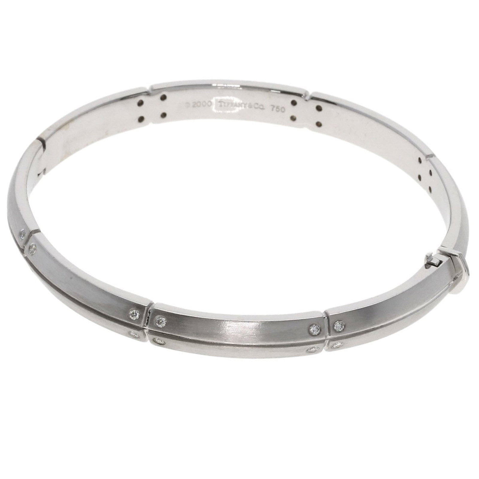 Tiffany Bangle 18K White Gold: Tiffany Bangle 18K White Gold Tiffany bangle made of 18K white gold, designed for women; measures 17cm in length and is in very good used condition with some minor scratches. Item Specifics: Brand: Ti