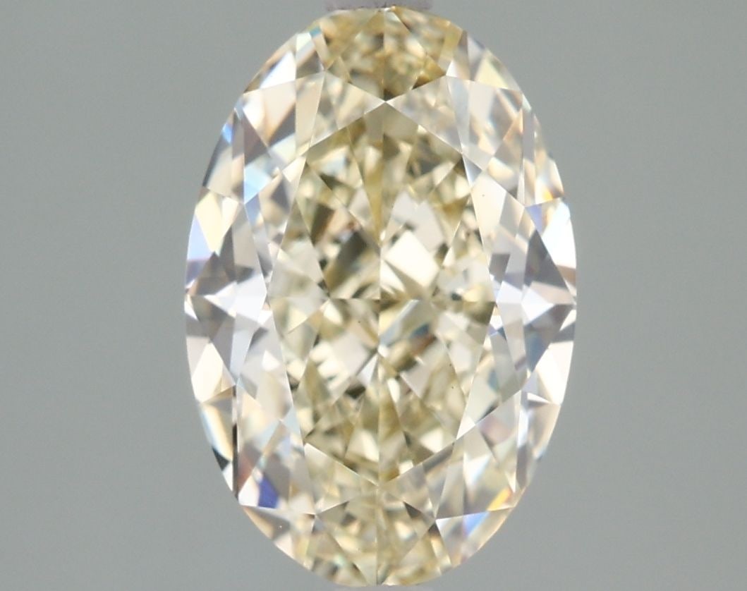 IGI Loose Lab Diamond 2.26ct Oval Fancy Yellow VVS2: IGI Loose Lab Diamond 2.26ct Oval Fancy Yellow VVS2 This loose lab diamond is 2.26ct in an oval shape, IGI-certified, with a Fancy Yellow color and VVS2 clarity, polished to excellence with measuremen