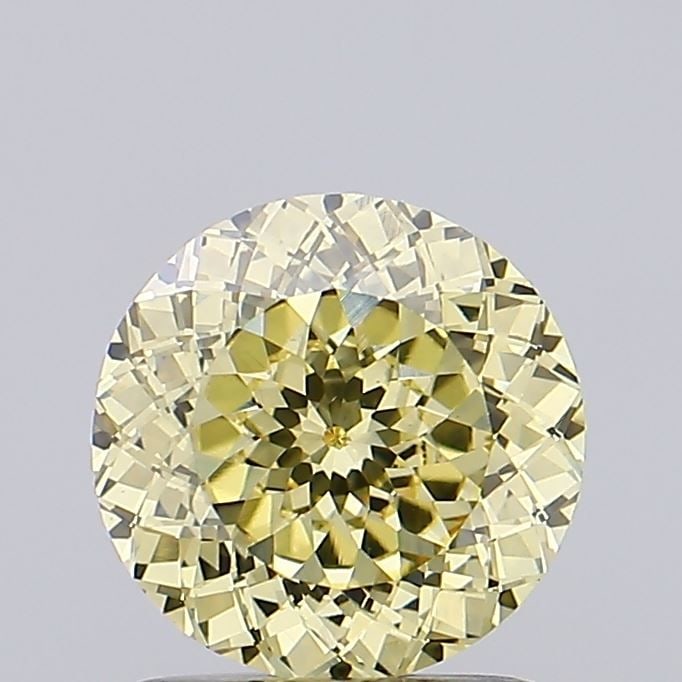 Loose Lab Diamond IGI Round 1.35ct Fancy Light Yellow VS2: Loose Lab Diamond IGI Round 1.35ct Fancy Light Yellow VS2 Loose lab-grown diamond weighing 1.35ct, cut round, with a Fancy Light Yellow color and VS2 clarity, certified by IGI. Item Specifics: