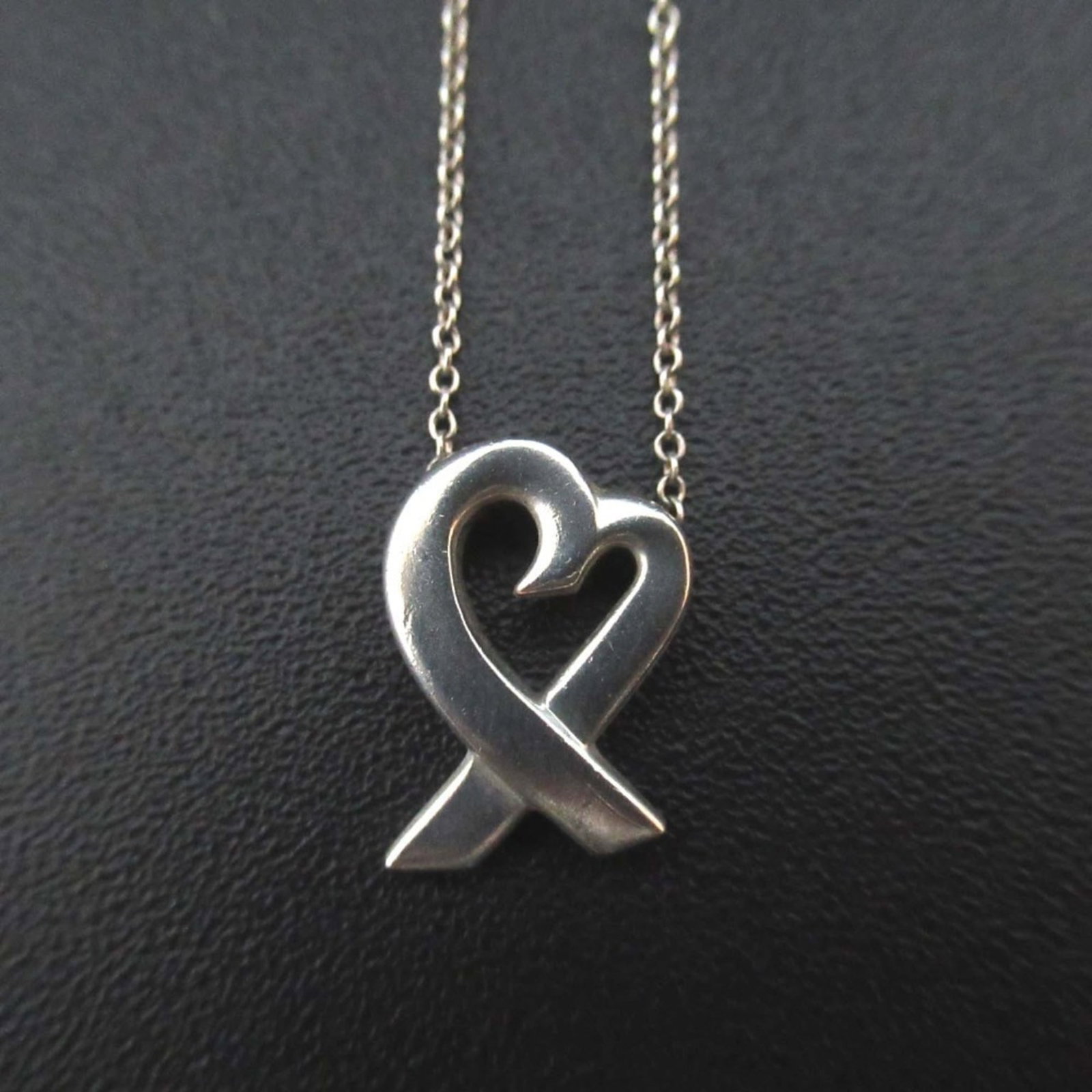 Tiffany & Co. Paloma Picasso Loving Heart Pendant Necklace in 925 Silver: Tiffany & Co. Paloma Picasso Loving Heart Pendant Necklace in 925 Silver Tiffany & Co. Paloma Picasso Loving Heart Pendant Necklace, crafted in 925 silver, features a pendant size of 15mm x 10mm and a