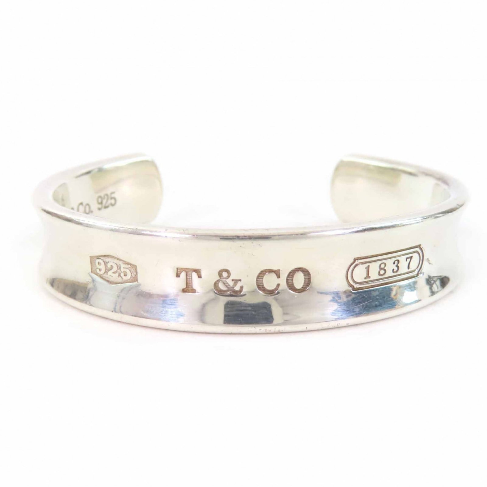 Bangle Tiffany: Bangle Tiffany Tiffany bangle for women made of silver925, length 12 cm, width 1.2 cm, weighs 35 g, in very good used condition. Item Specifics: Brand: Tiffany Type: Bangle Gender: Women Metal: Silver