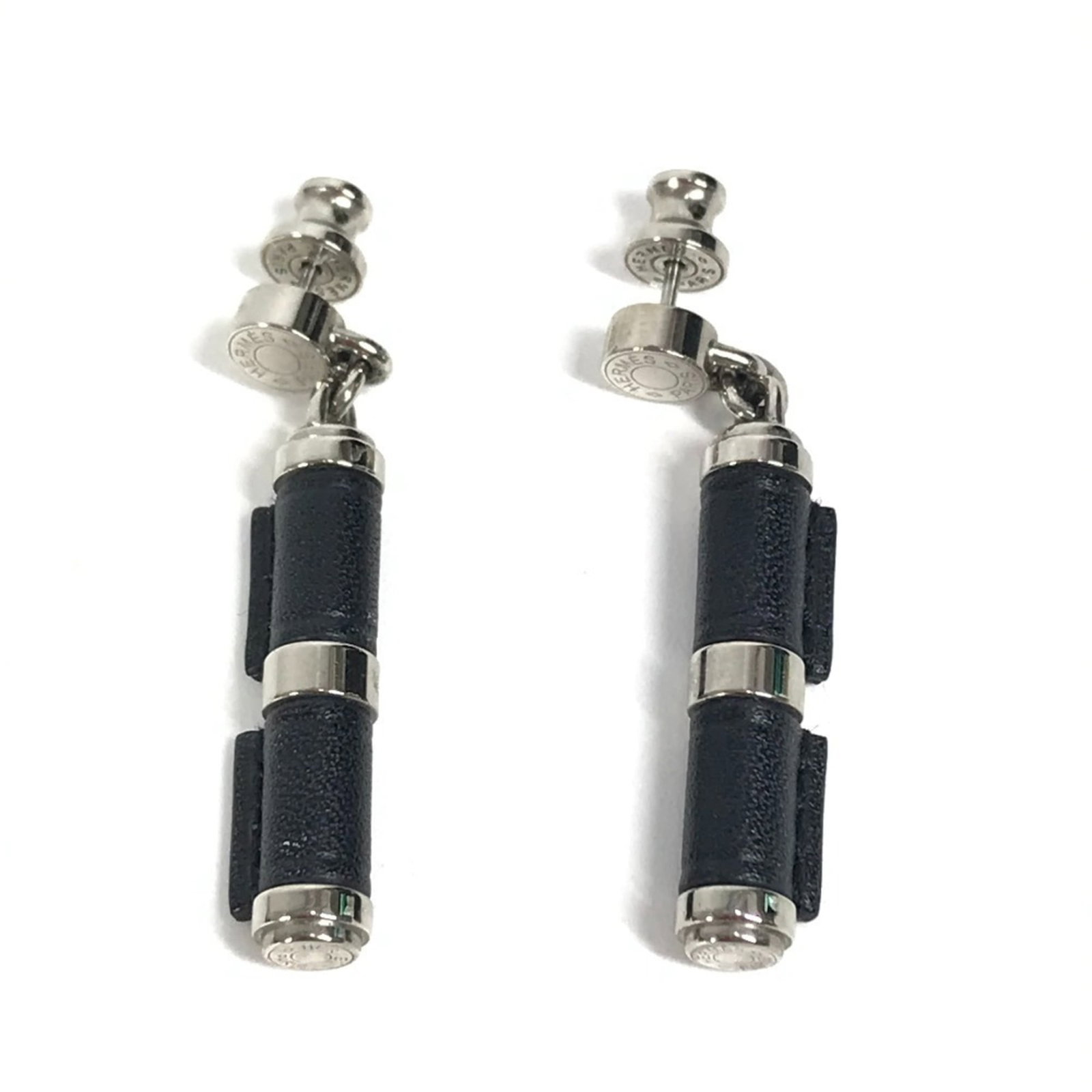 Hermes Drop Earrings Metal with Swift Leather: Hermes Drop Earrings Metal with Swift Leather The Hermes Drop Earrings are made from metal and Swift leather, suitable for men, women, or unisex, featuring a black color. They are in very good used co