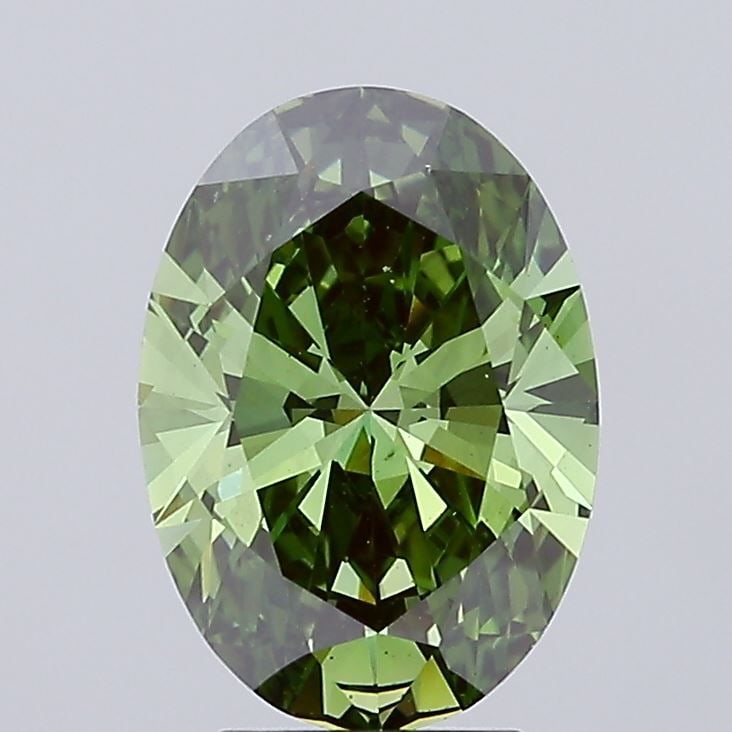 Loose Lab Diamond IGI Oval 3.01ct Fancy Vivid Green VS1: Loose Lab Diamond IGI Oval 3.01ct Fancy Vivid Green VS1 This loose lab-grown diamond weighs 3.01 carats, features a fancy vivid green color, and has a clarity of VS1, with IGI certification. It