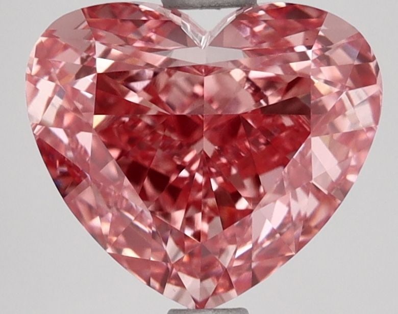 Loose Lab Diamond 3.03ct Fancy Vivid Pink VS1 - IGI Heart: Loose Lab Diamond 3.03ct Fancy Vivid Pink VS1 - IGI Heart Loose lab-grown diamond weighing 3.03ct with a fancy vivid pink color and VS1 clarity, certified by IGI, measuring 8.32L x 9.54W x 5.1H mm. 